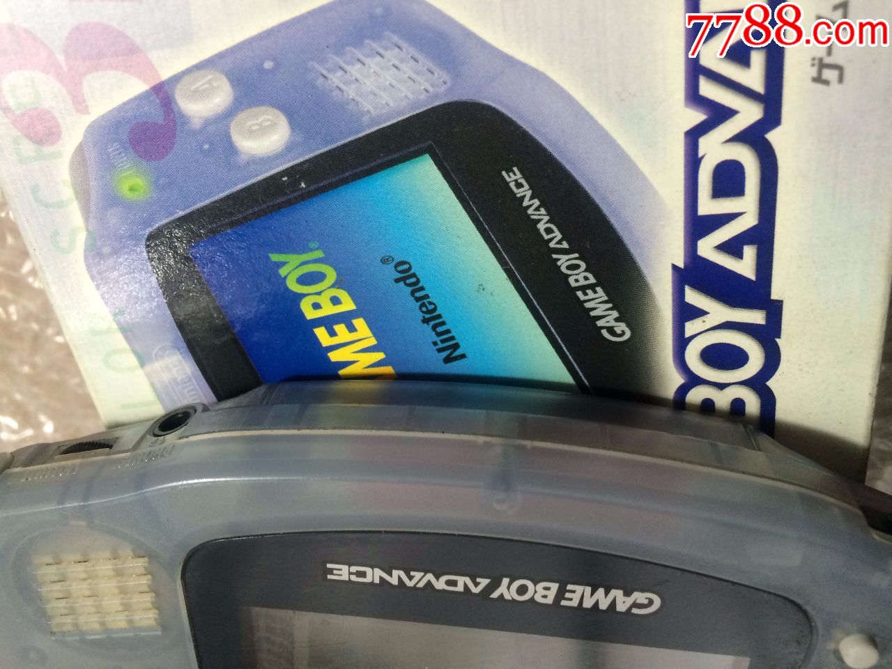 一台带包装盒说明书任天堂GBA手掌机游戏机