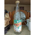 80年代天津市饮料厂天津牌《鲜桔子汁》瓶,标签完整,带原盖原塞,品佳
