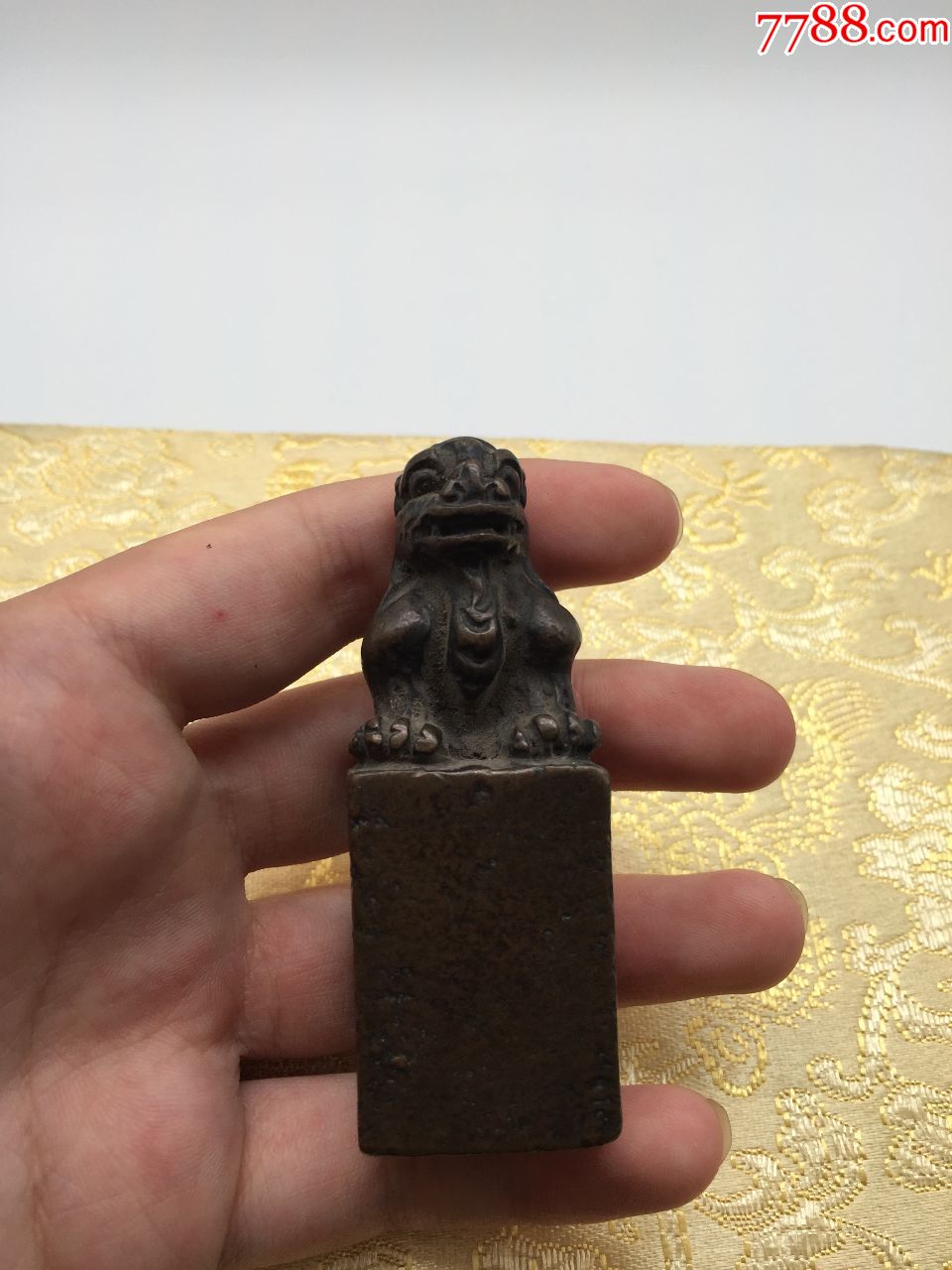大个铜狮子章料