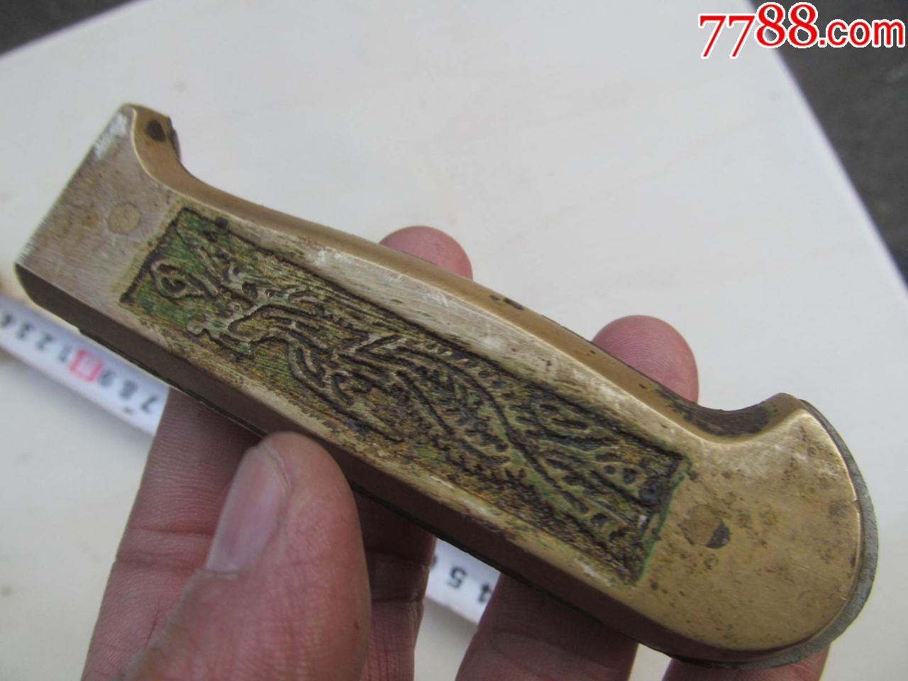 有龙凤图案的刀把,铜的