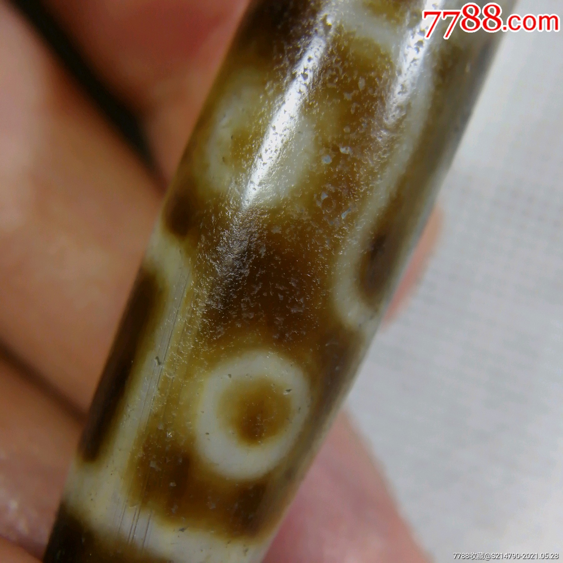 透光藏传九眼玛瑙天珠【宝贝尺寸:长53宽13毫米左右【收藏逼格:1
