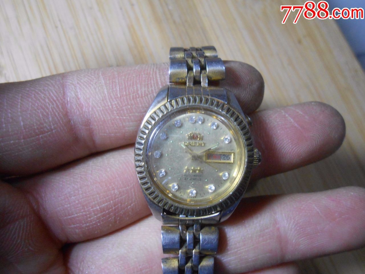 双狮包金镶钻55841女表老手表1212-42