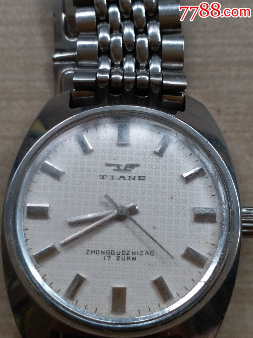 老天鹅手表走时原装把头