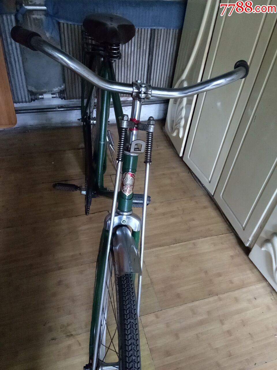 28型绿色的孔雀牌自行车