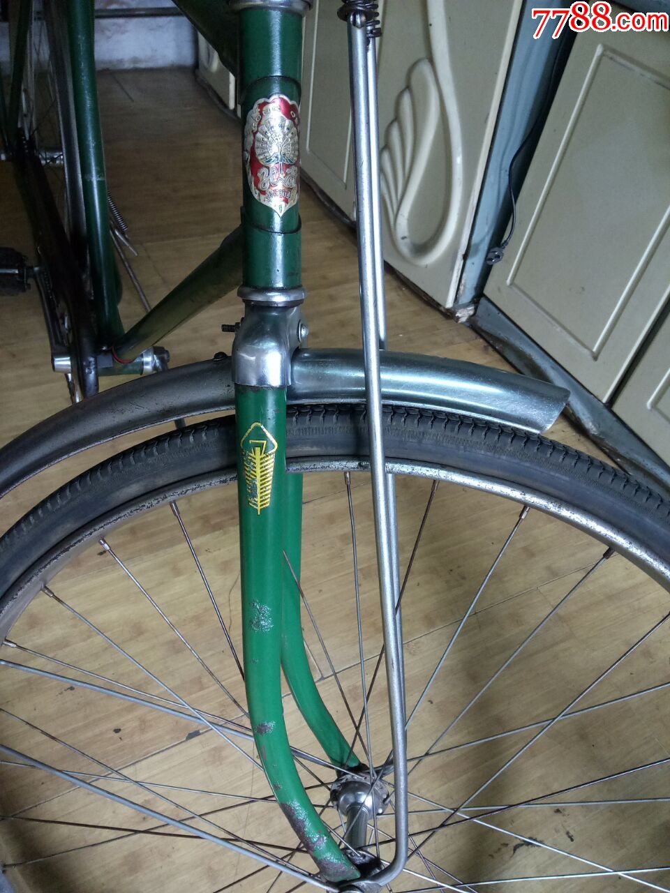 28型绿色的孔雀牌自行车