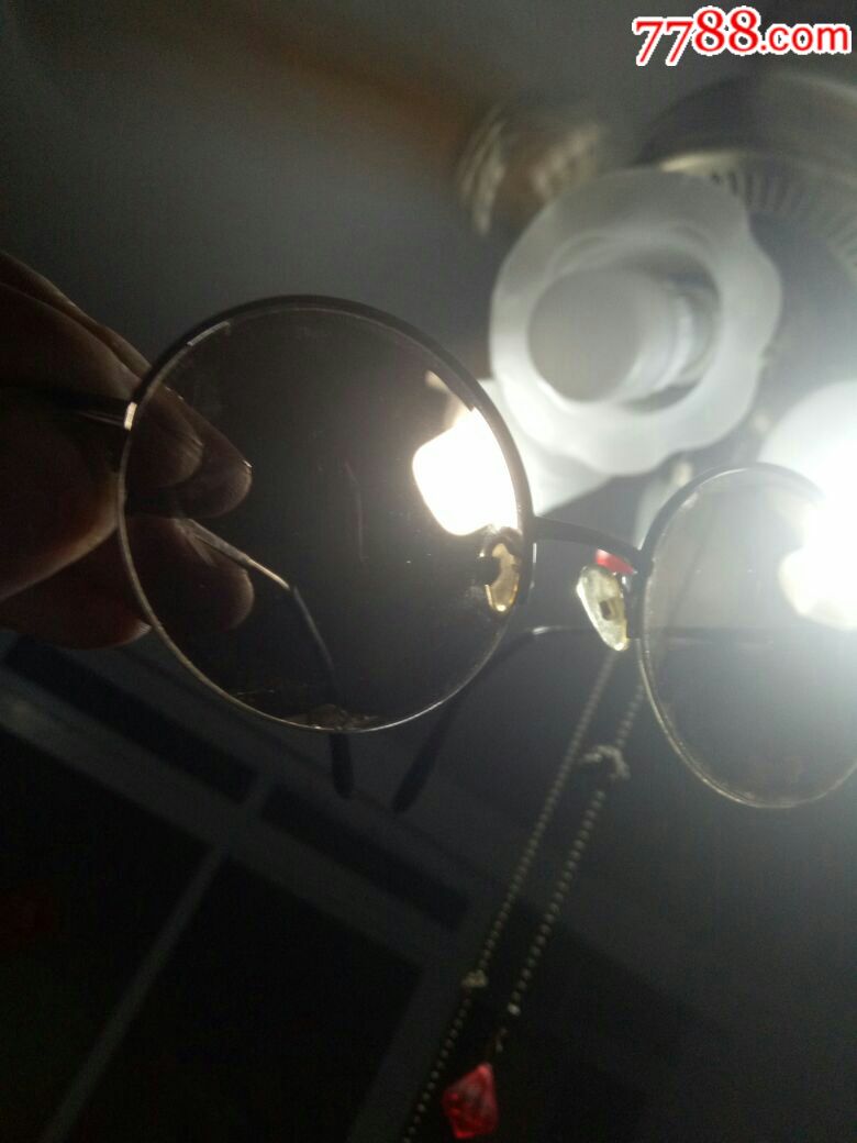 天然水晶茶晶镜片,灯里可照双影.灯里可里看水晶绵.由三片合成.