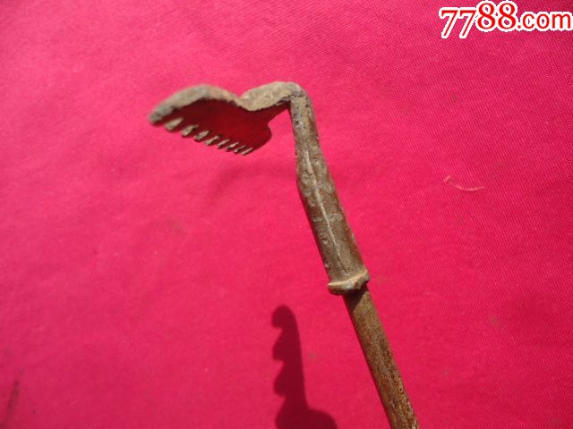 怀旧玩具猪八戒耙子