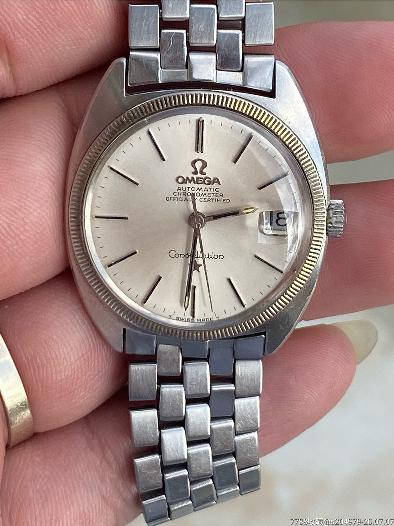 18k白金牙圈欧米茄星座自动机械男表