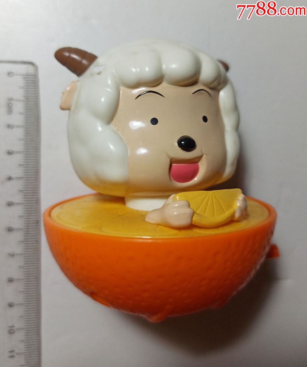喜羊羊吃西瓜上发条玩具一件