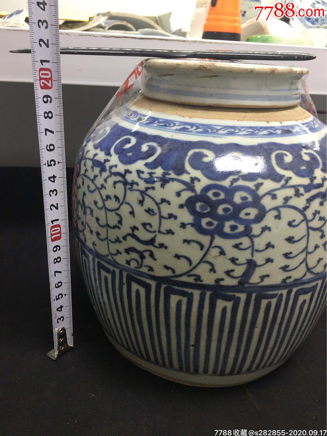 清中期缠枝花卉人头罐