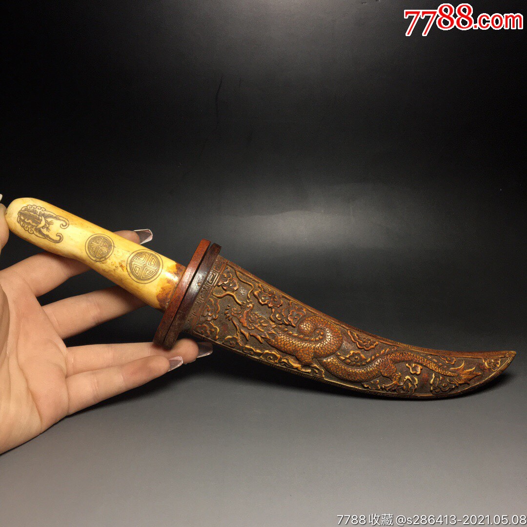 牛骨刀牛骨是原始自然粗犷豪放具有辟邪化吉之寓意也给佩戴者增添一种
