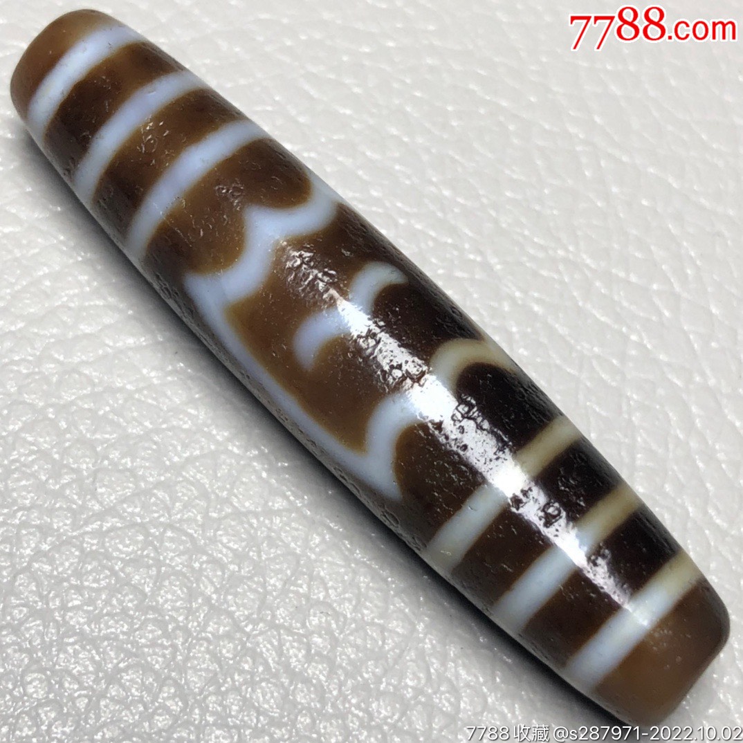 藏区回流老料高油包浆【大鹏鸟天珠】尺寸:56*12毫米重量14.