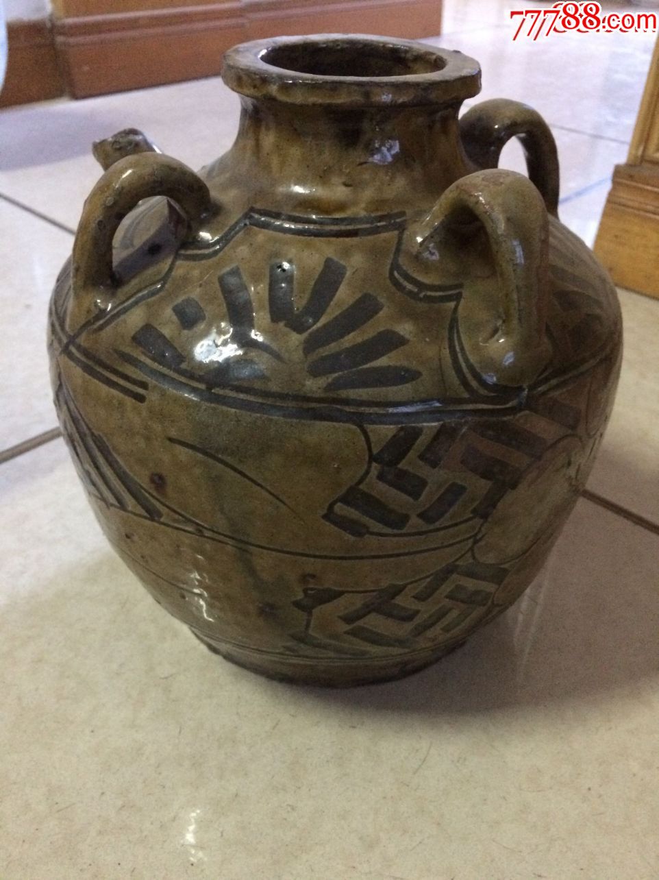 马口窑黄釉罐剔花