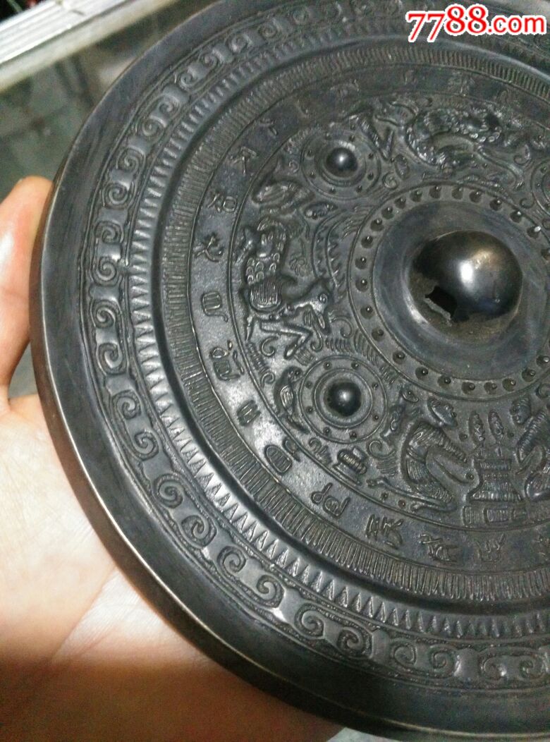 唐代黑漆古包浆海兽纹葡萄铜镜
