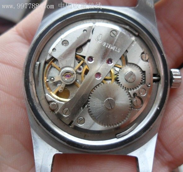 一款上海春蕾牌手表,盘面特别,机芯有细致磨花状打磨