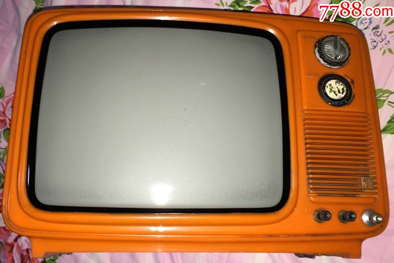 孔雀牌电视机应该是黑白的投影,电子管的