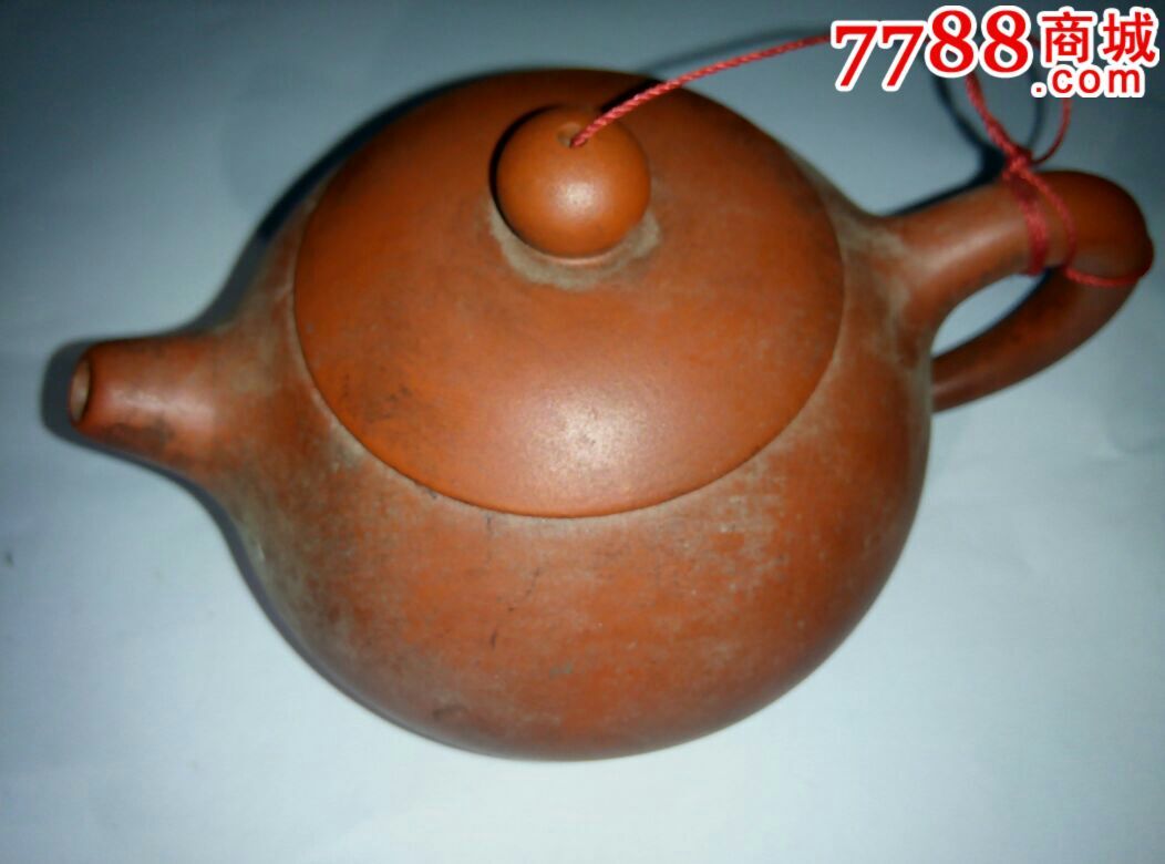 其他泥质,其他颜色,其他造型,素面,,,,,,, 简介:鉴窑,紫砂网球壶,全好