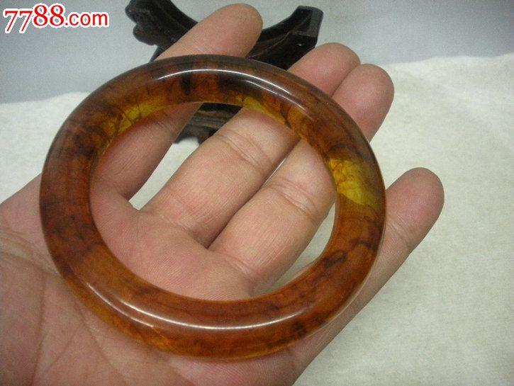 稀少难得的老琥铂圆条手镯包真俘水