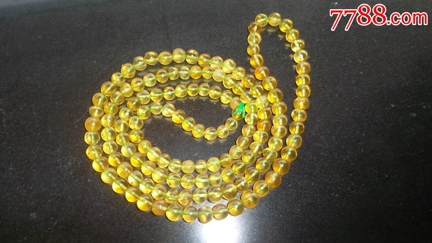 缅甸金珀,微微杂裂,尺寸7毫米,重量:27.5克,金珀1