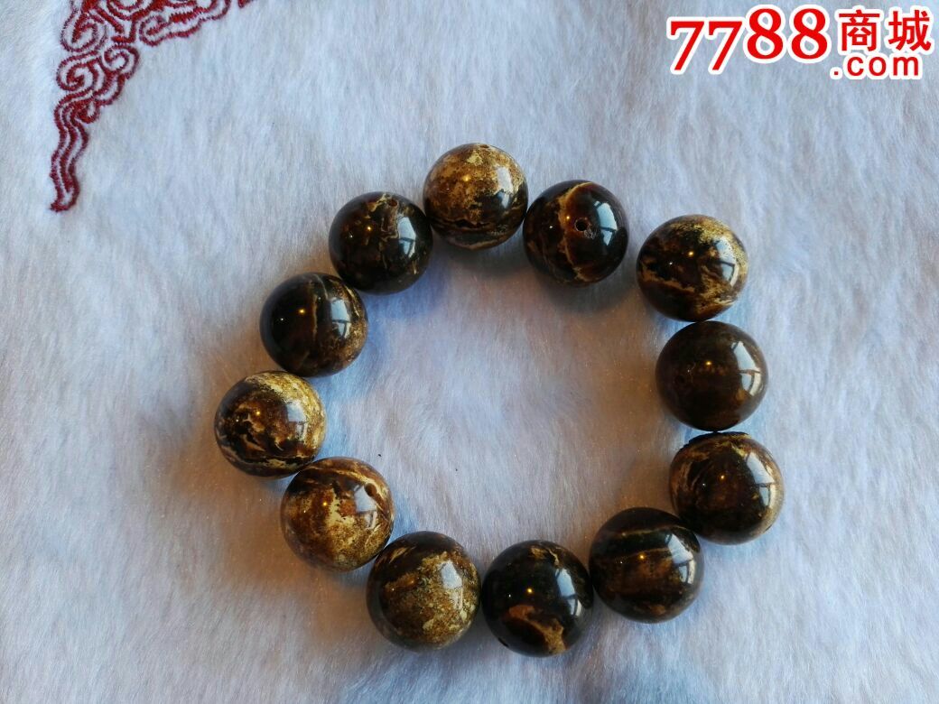 原矿抚顺花珀粉压制手串