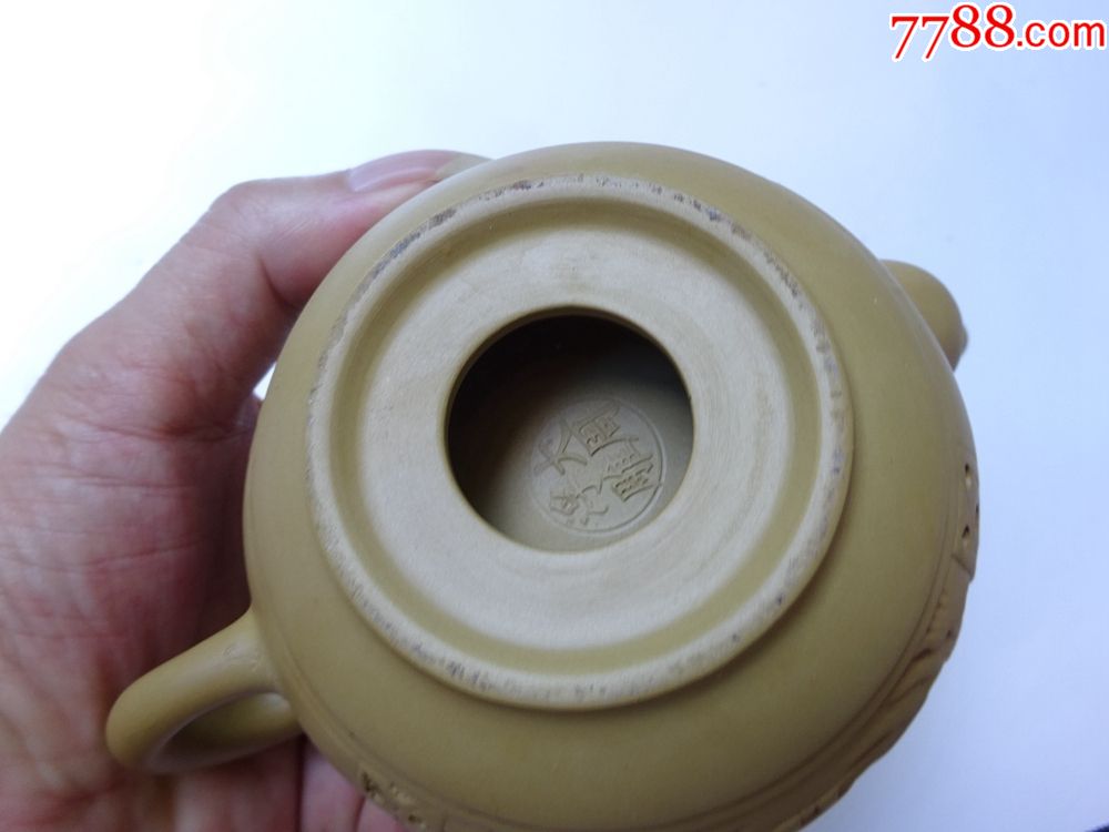 大周浮雕镂空紫砂壶
