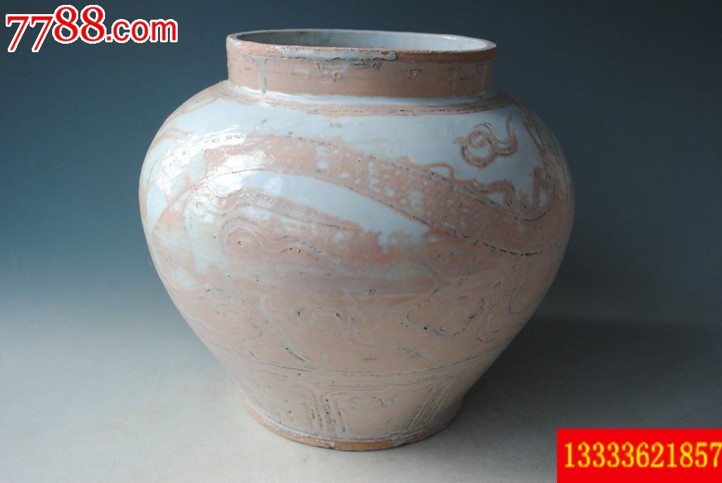 元代白釉刻云龙纹大罐高29.7厘米蜕皮