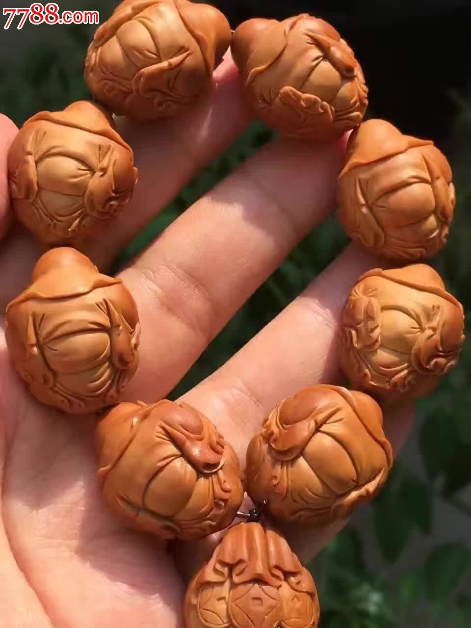 刘人义款八大弥勒开脸-橄榄核雕-7788收藏